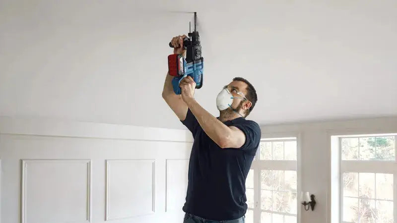 مثقاب مطرقة لاسلكي عالي التحمل من بوشو بقوة 118 فولت مع بطارية مزدوجة، ومشبك تثبيت SDS Plus، ومطرقة دوارة متعددة الوظائف، وتصميم وحدة تروس للخرسانة والمعادن والخشب